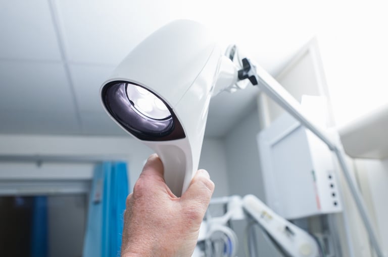 Doctor adjusting LED lamp
